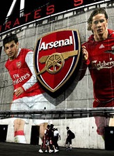 Arsenal and Liverpool footballers - picture of the Emirates Stadium