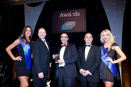 Nadeem Azam, founder and CEO of Azam Marketing, collecting the Award for Best Finance Publisher