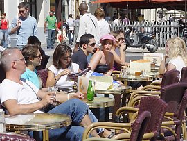 Long leisurely afternoons in the cafe are a part of French life, but will it impact on the country's prosperity?